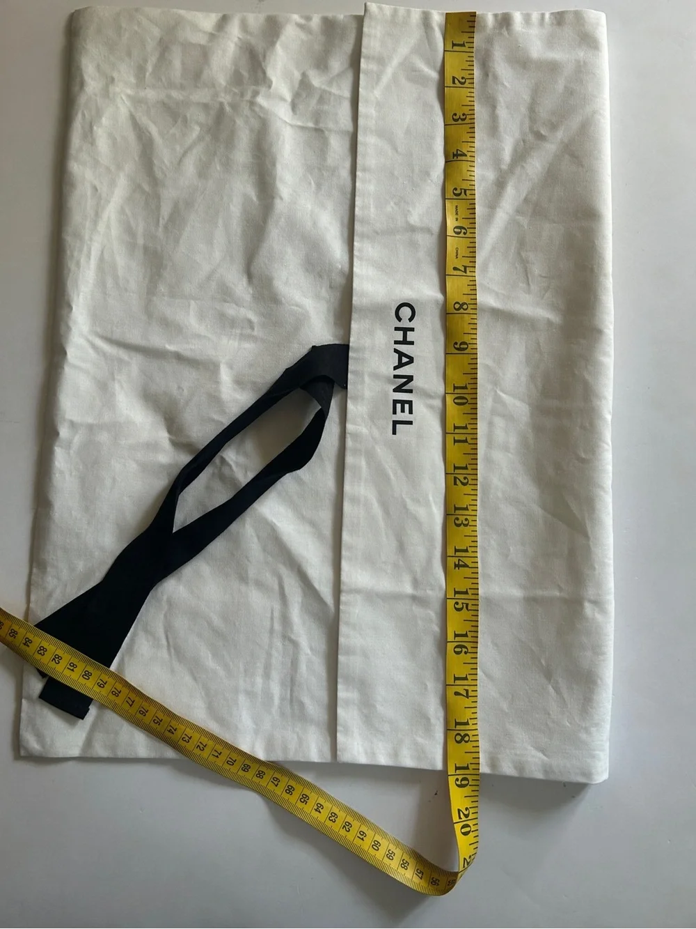 CHANEL White Dust Bag with Black Logo and Tie